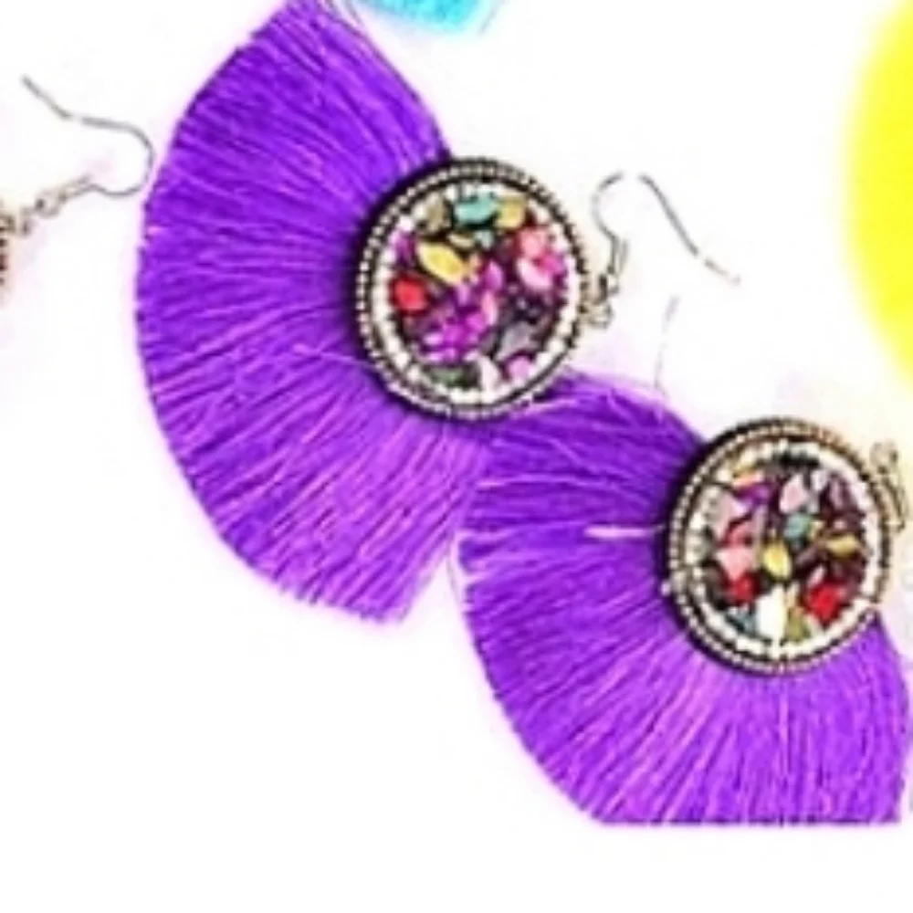 Reformation tassel fan